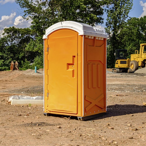 what is the cost difference between standard and deluxe portable restroom rentals in Vandervoort AR